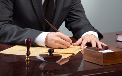 Signing testament Businessman writing testament at notary public office